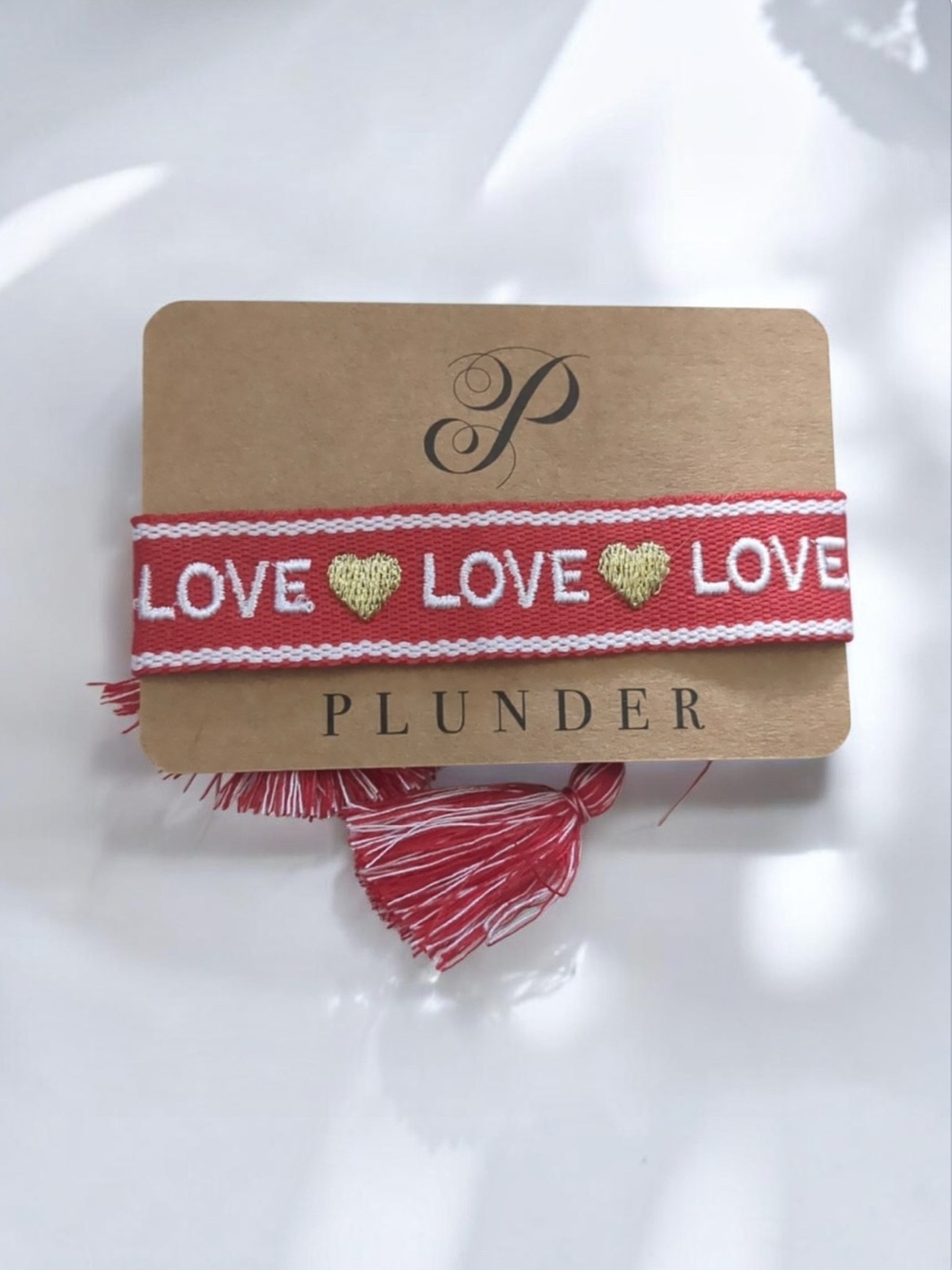 Plunder Red & White Tassel Tie Bracelet with “LOVE” and Gold Hearts Embroidered